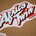 https://eshop-stickers.com/sites/default/files/imagecache/product_full/gallery_photos/1/honda_africa_twin_xrv_750_1995_1998_silver_red_decals_stickers_set_kit_printed_img_6504.jpg